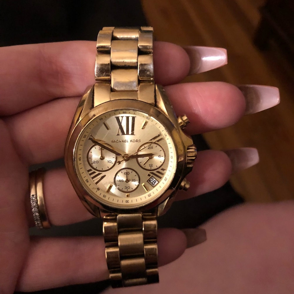 Gold Michael Kors watch with case included